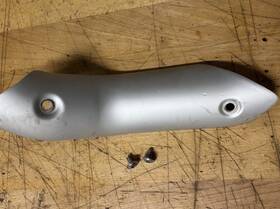 2b010903 Aprilia Oem Tuareg Exhaust Foot Shield. Original Part