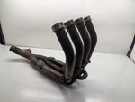 Yamaha YZF-R6 Exhaust Headers 5EB-14602-00-00 Black 1999-2000. Fixed Price $80.00.