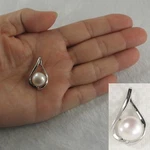 Sterling Silver 925 Wave White Pearl Pendant. Fixed Price $39.95.