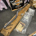 Nos Open Box Harley Chrome Exhaust Bracket Kit Flstc Softail Fxsts 65526-98. Fixed Price $112.00.