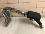 Suzuki Exhaust Oem Part 14100-15J00. Fixed Price $950.00.