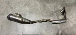 Kawasaki KLX230 Exhaust Pipe / Muffler. Fixed Price $80.00.