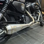 Harley Into Exhaust Sportster Performance Muffler 883/1200. Fixed Price $450.00.