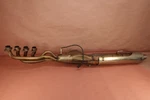 1999 - 2004 Bmw Exhaust Pipe Headers Muffler. Fixed Price $189.49.