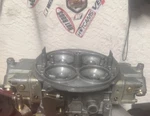 Holley Dominator 1050 12R-8795B 3 Circuit Carburetor. Fixed Price $450.00.