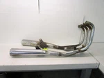 1985 Suzuki Gs 700E Exhaust Muffler Head Pipes 14302-06A02-H01. Fixed Price $395.00.