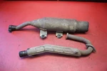 1987 Suzuki Quadrunner 230 Exhaust Pipe Muffler. Fixed Price $99.99.