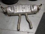 2008-2010 Porsche Cayenne Rear Exhaust Muffler Part Number 95511112165. Fixed Price $500.00.