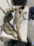 2001 Suzuki Quad Runner 250 Exhaust Pipe With Guards / Covers Shields. Fixed Price $60.00.