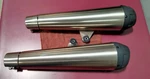 Triumph Speed Twin Stock Mufflers 2204415 & 2204416. Fixed Price $1150.00.