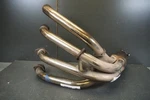Downpipe GSF1200 K1-K6 Suzuki Exhaust 14100-32F11 23815. Fixed Price $337.28.