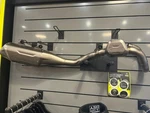 Triumph TF250-X Akrapovic Full Exhaust System #A9601343 Display Model. Fixed Price $1450.00.
