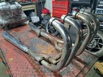 1981 Suzuki GS550T Exhaust Pipes Muffler Pair Set No Holes. Fixed Price $150.00.
